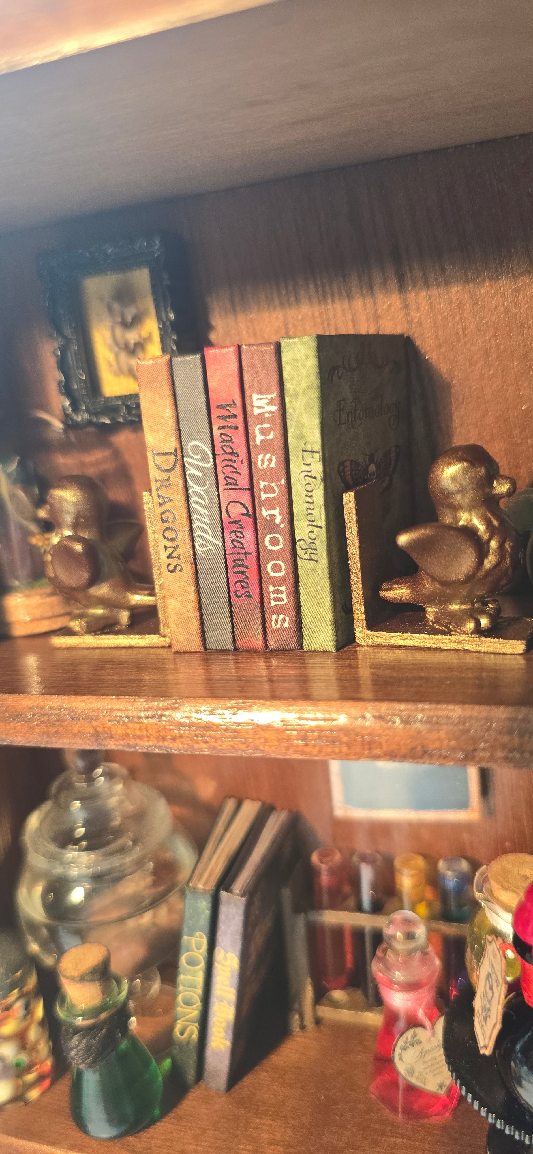 Miniature hand-drawn readable spellbooks and shimmering potion bottles on wooden shelf
